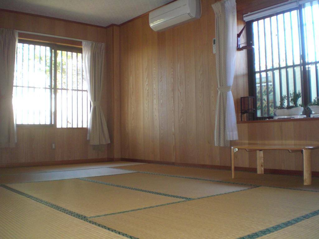 Minshuku Shizu Hotel Onna Szoba fotó